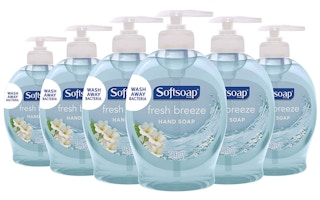 Six Softsoap Fresh Breeze soap bottles lined up horizontally
