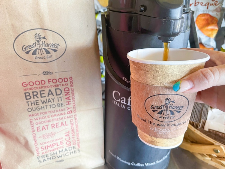 cup being filled with coffee at great harvest