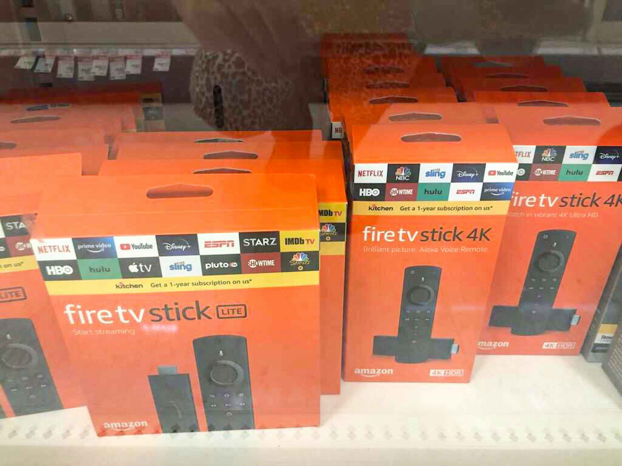 fire tv sticks on in a cabinet at target