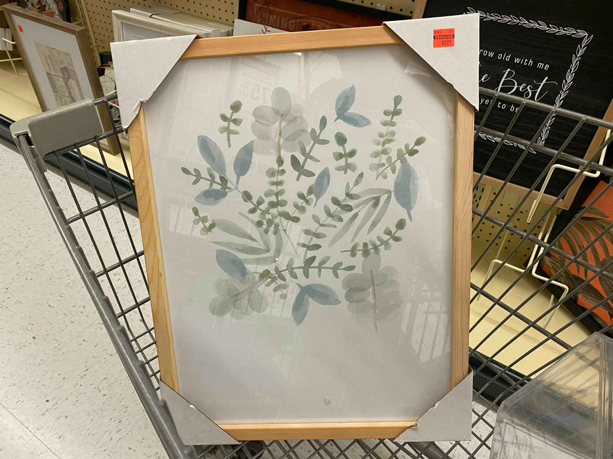 art piece with flowers and plants