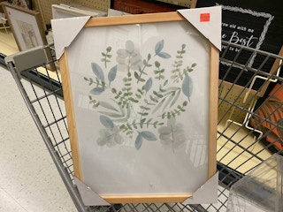 art piece with flowers and plants