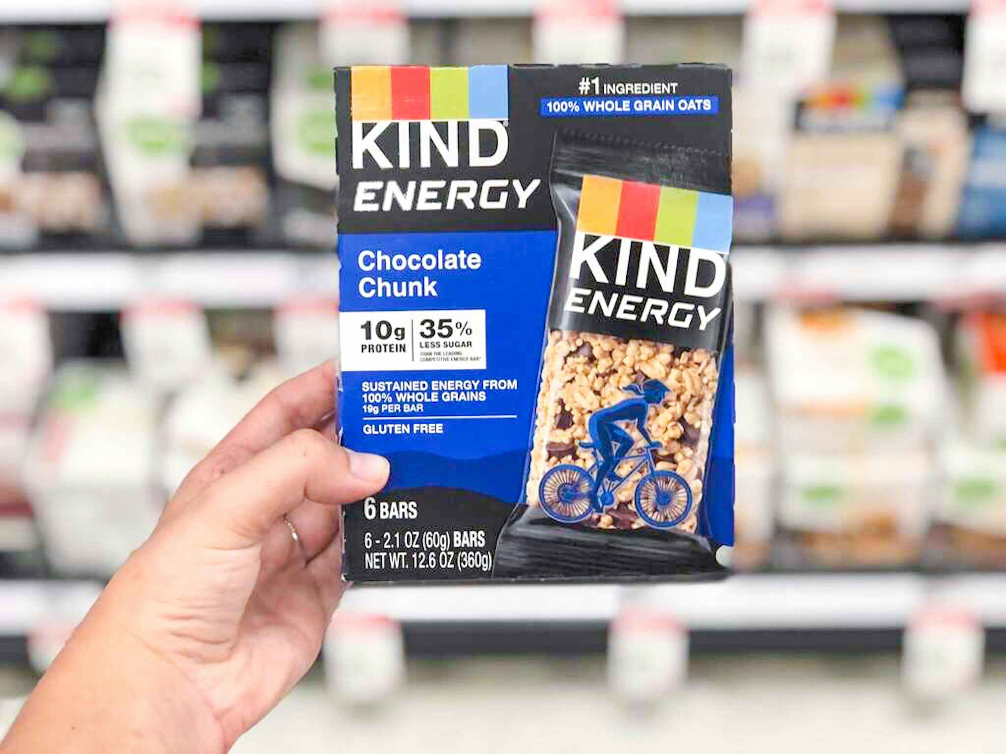 hand holding a box of kind energy bars at target