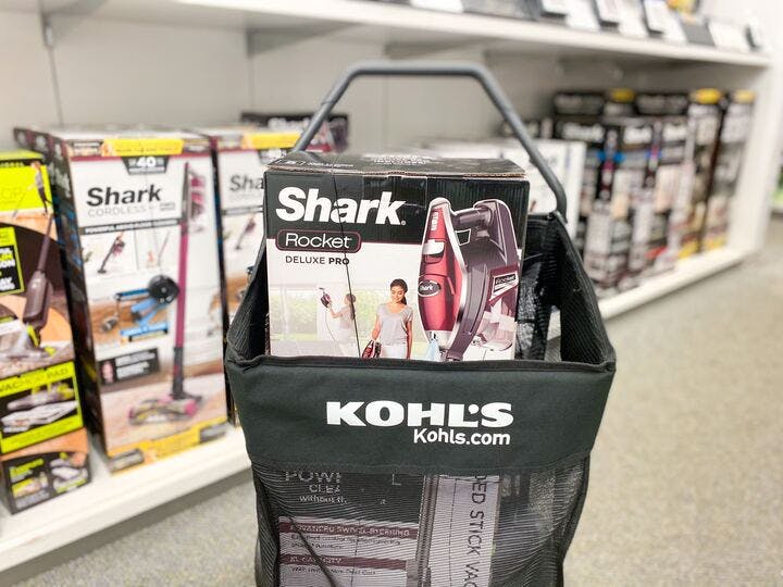 A Shark vacuum in a Kohl's shopping basket