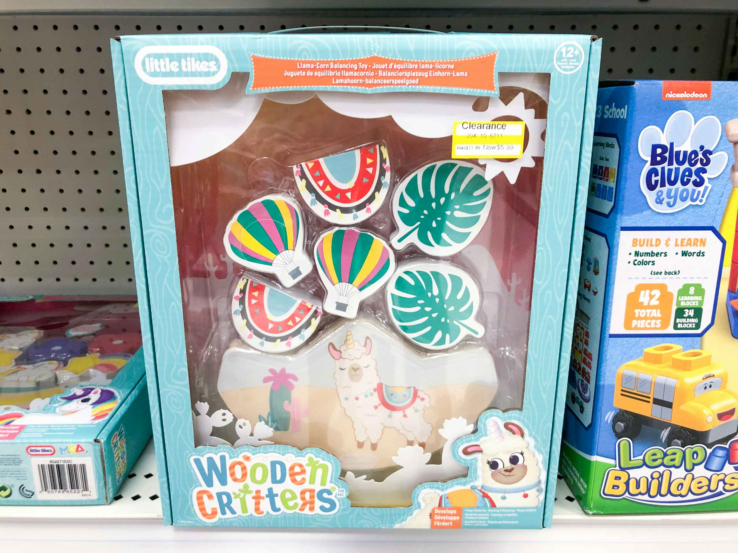 Little Tikes wooden critter toy on store shelf on clearance
