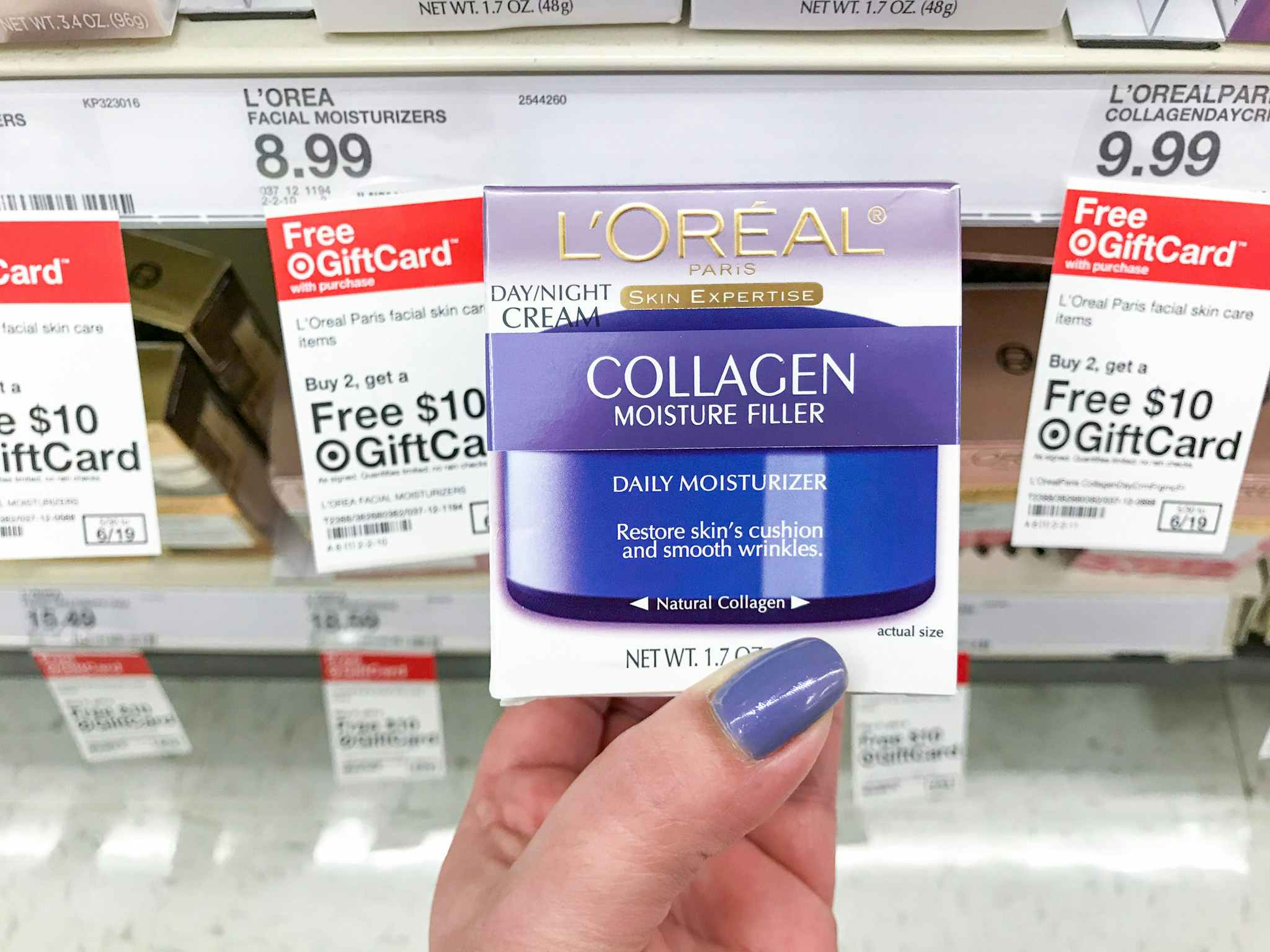 hand holding l'oreal collagen filler cream in front of promotion target tag