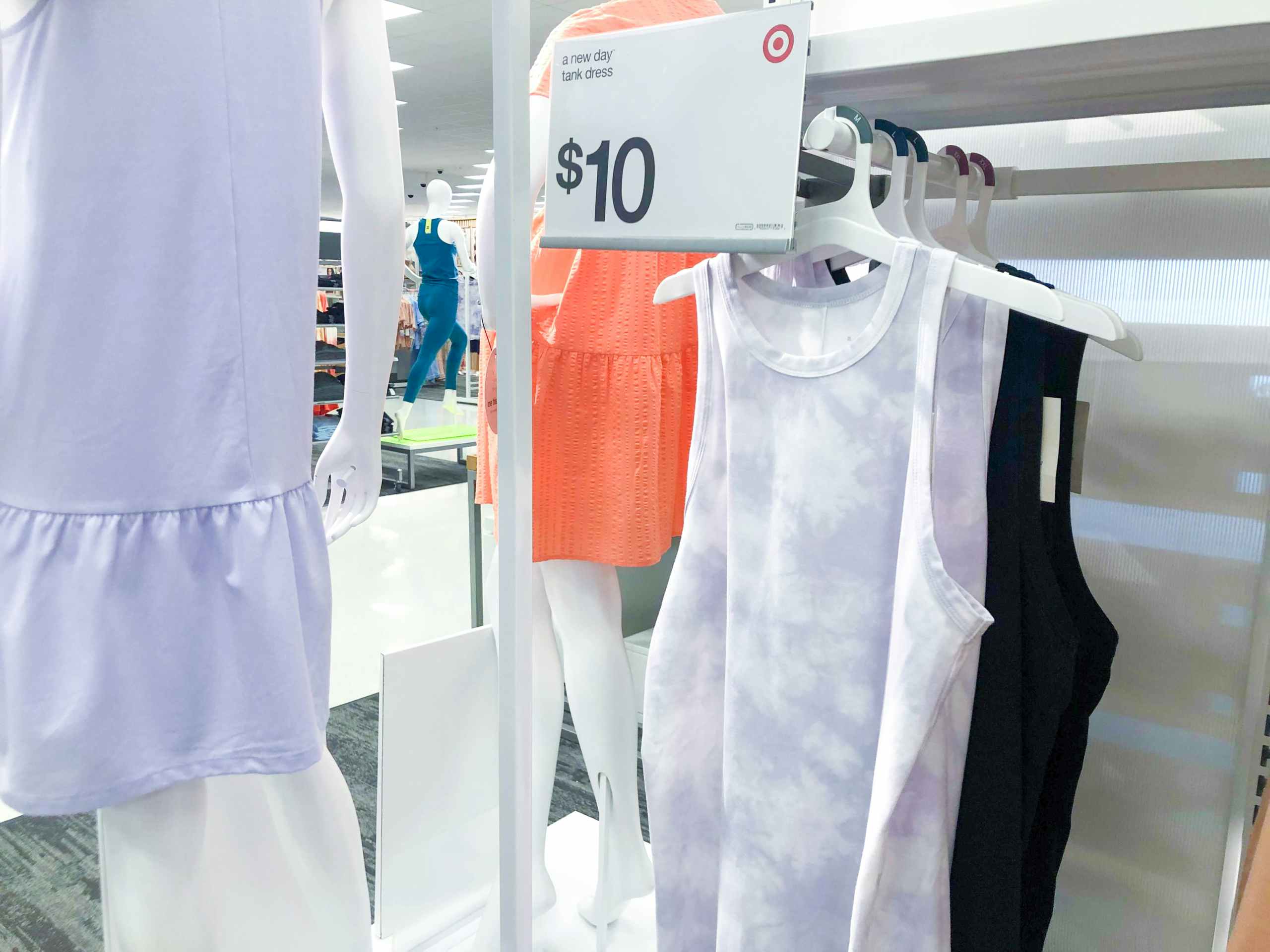 dresses hanging on hanger display at target