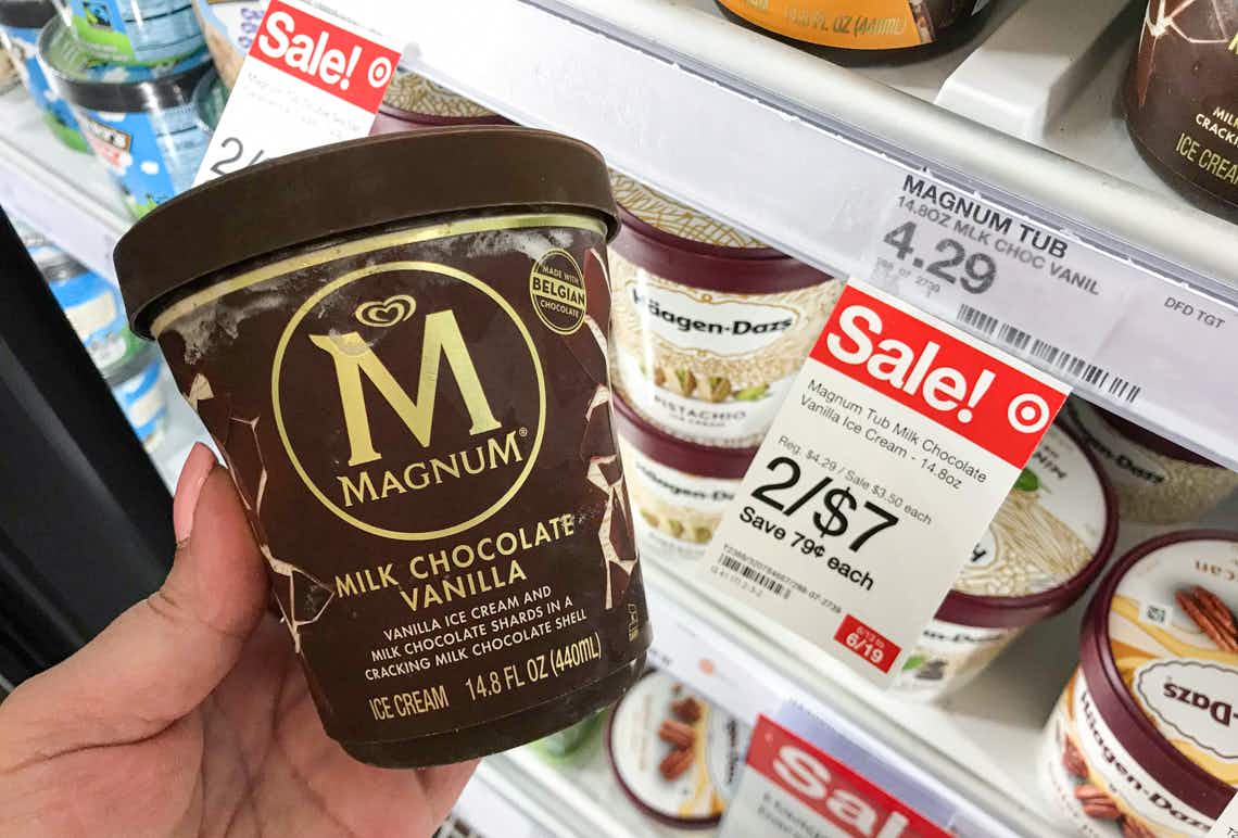 pint of magnum ice cream held in front of target sale tag 