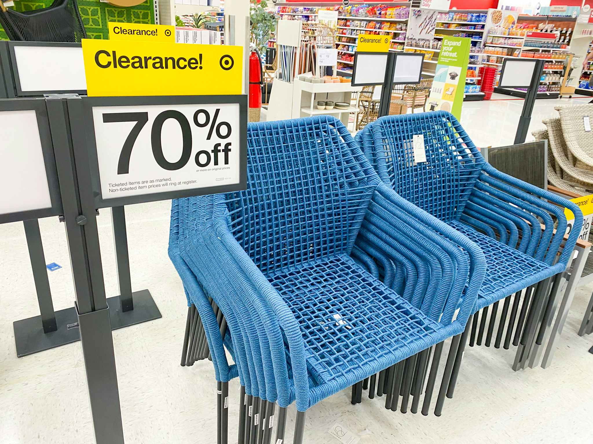 70% off clearance sale sign next to patio furniture at Target