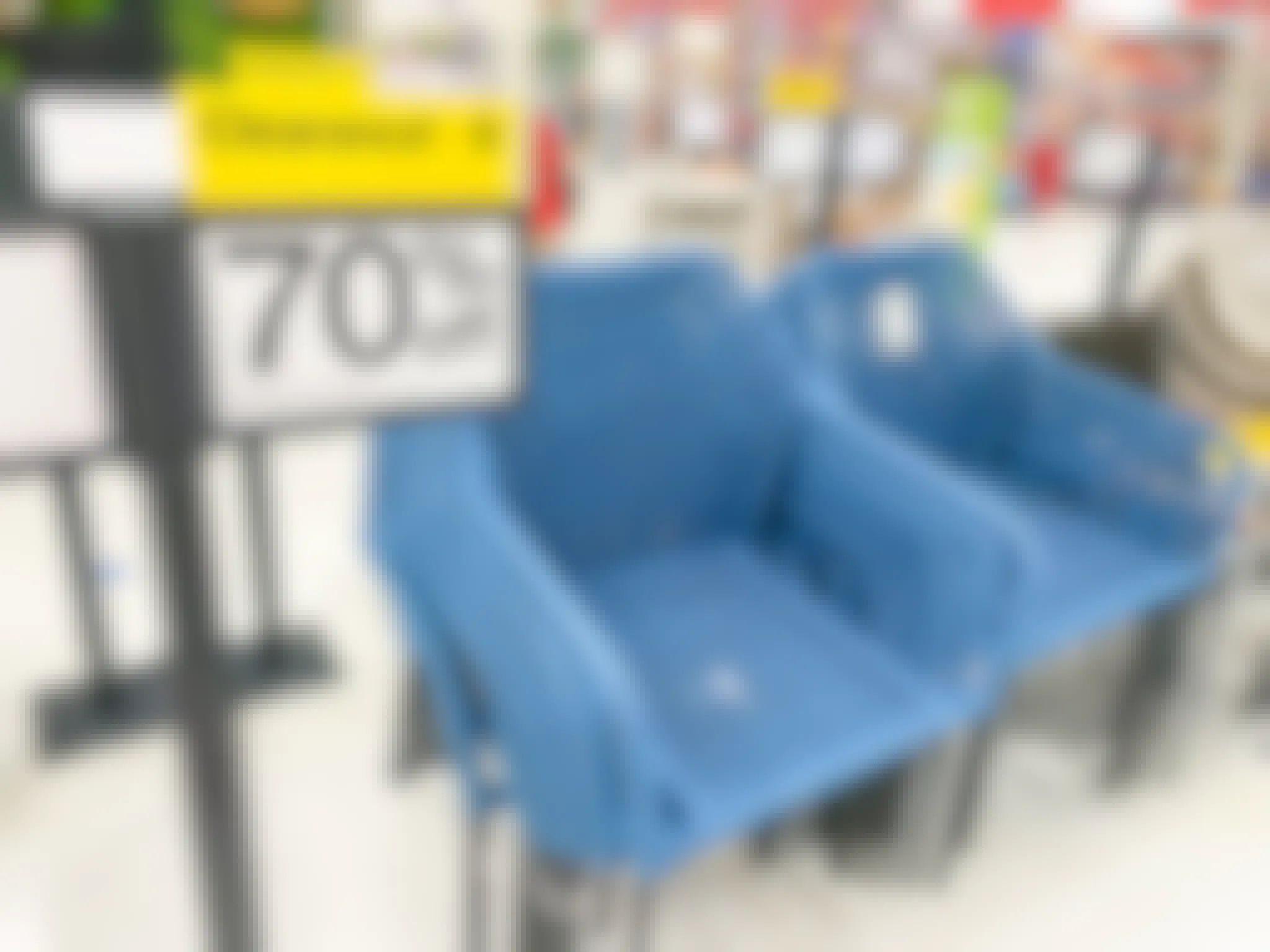 70% off clearance sale sign next to patio furniture at Target