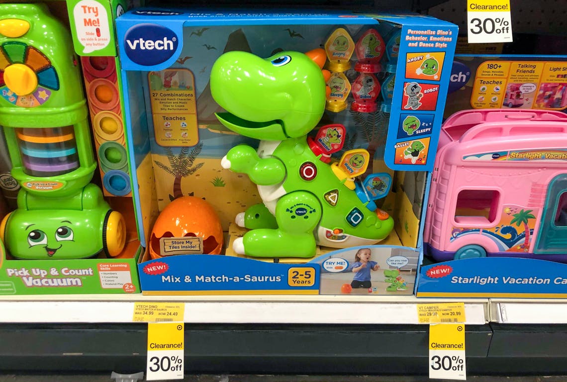 A Vtech Mix & Match-a-Saurus toy on a shelf at Target with a sale tag for 30% off.