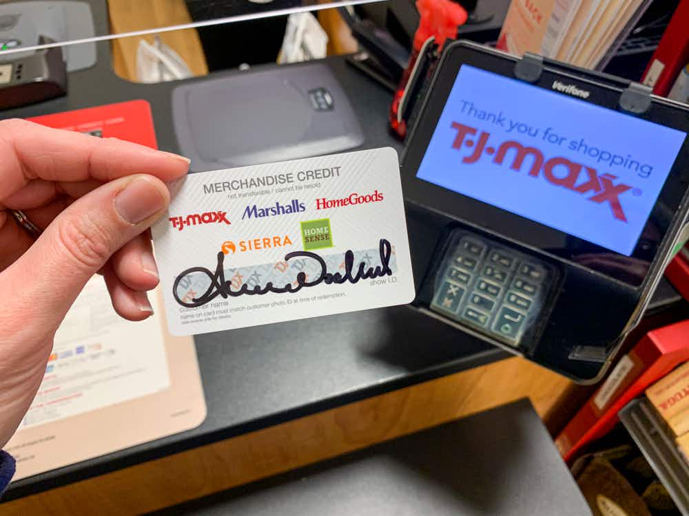 TJ Maxx Merchandise card held in front of a credit card reader