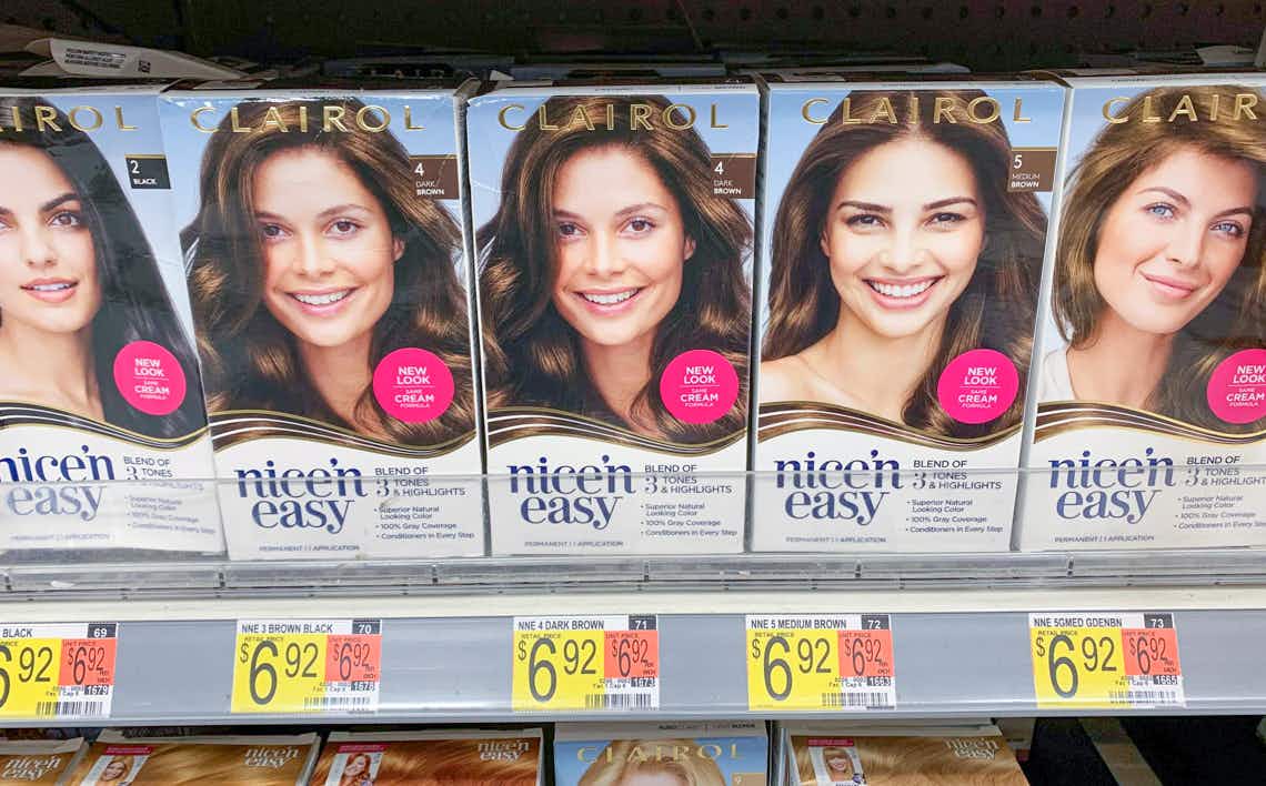 boxes of clairol nice 'n easy hair color on walmart shelf with price tags