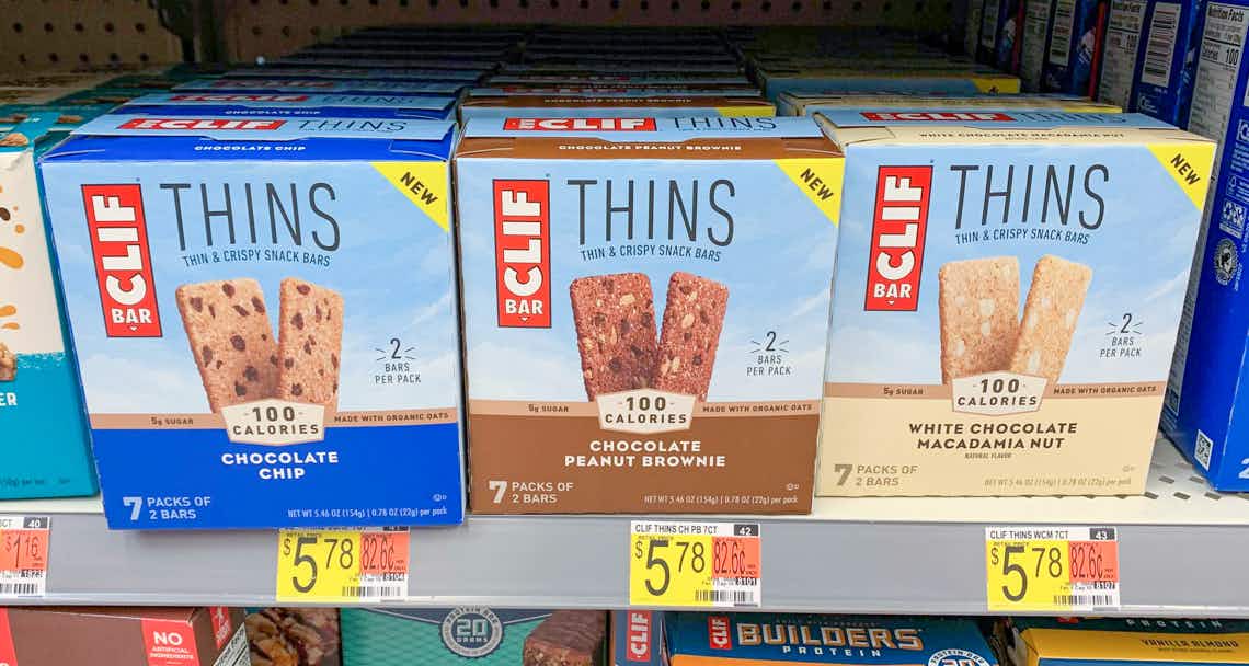 three boxes of clif bar thins in three different flavors on walmart shelf