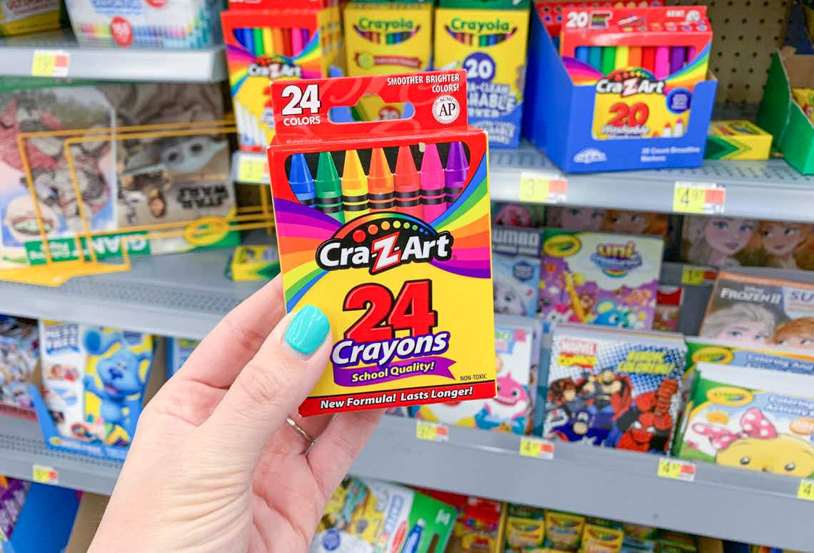 cra-z-art crayons held in front of school supplies at walmart