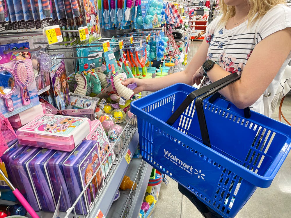 A woman shopping for products in the walmart dollar spot