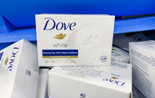 dove white beauty bar in small box on top of other dove beauty bars at walmart in travel section