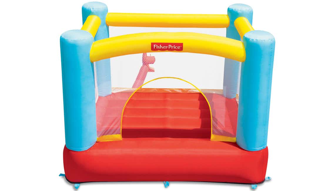 stock photo of fisher-price inflatable bounce house on white background