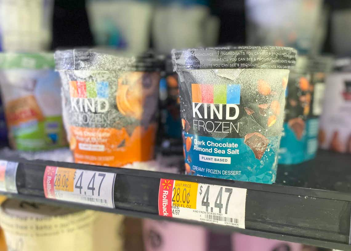 two pints kind ice cream on walmart freezer shelf with rollback price tags 