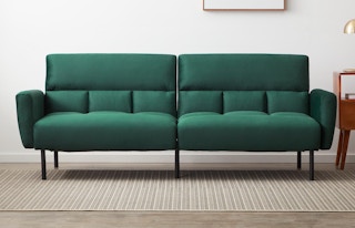 stock photo of green velvet mayview sofa bed in a living room setting
