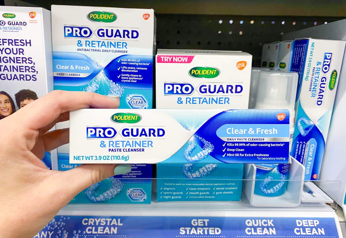 polident proguard and retainer cleanser paste held in front of other polident proguard products