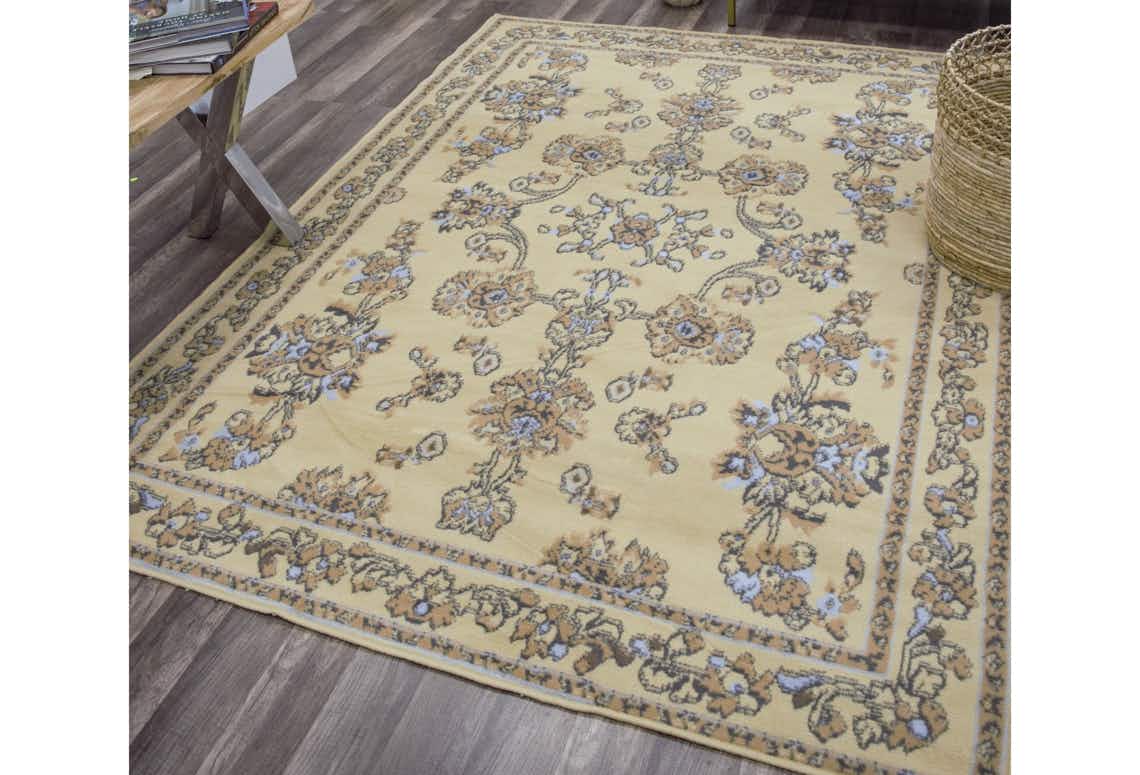 stock photo of rugs america beaumont traditional ivory rug on a floor
