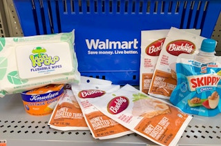 knudsen buddig kandoo and skippy in front of walmart hand basket sitting on shelf