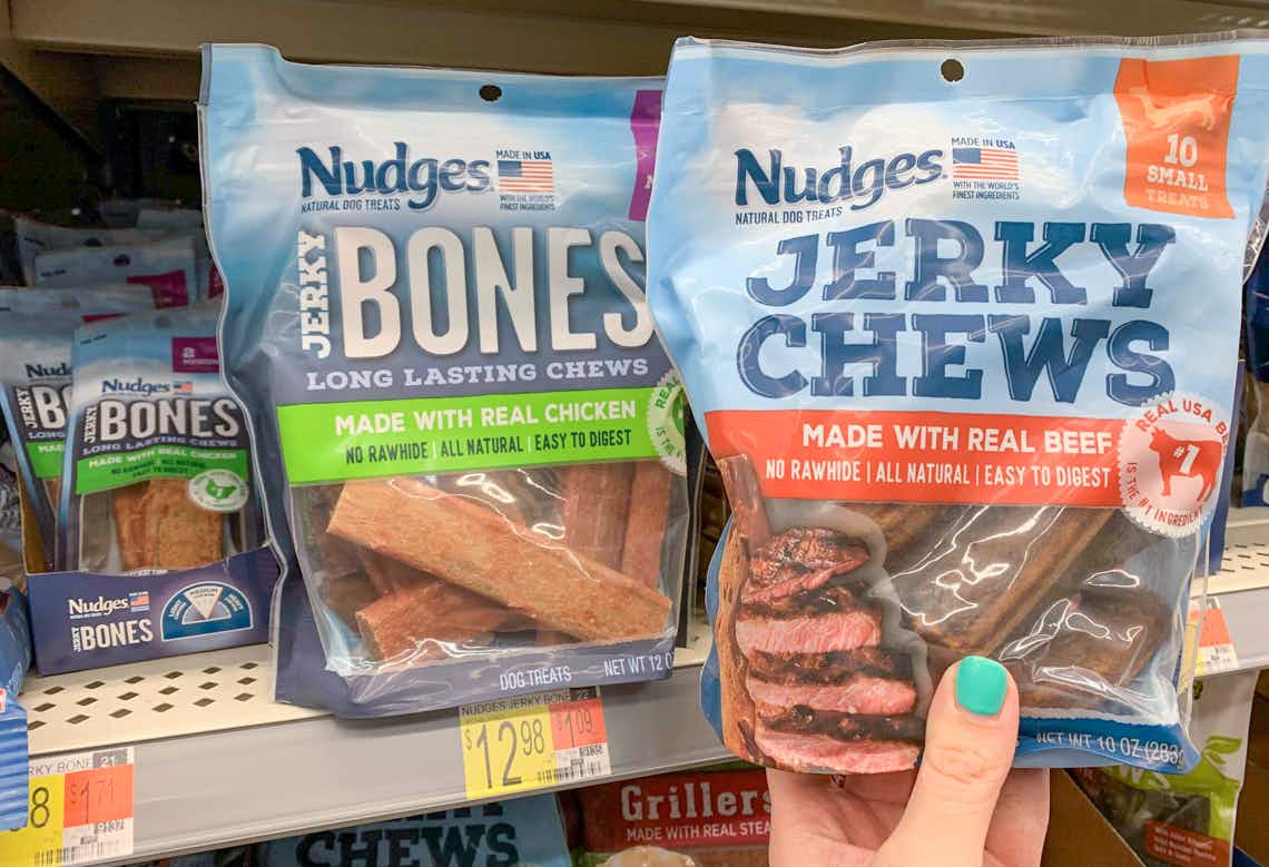 bags of tyson nudges jerky dog bones and chews on and near walmart shelf with price tag