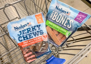 one bag of tyson nudges jerky chews and one bag of tyson nudges jerky bones dog treats in walmart cart