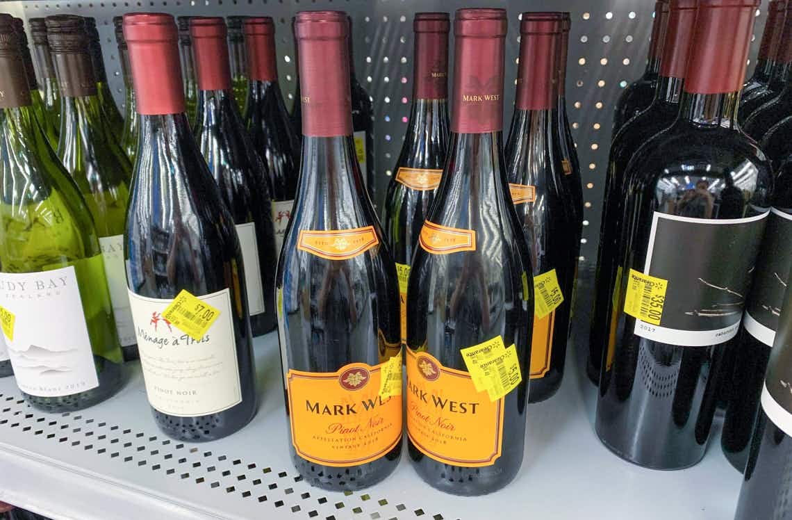 bottles of mark west pinot noir wine on walmart shelf with clearance price tags