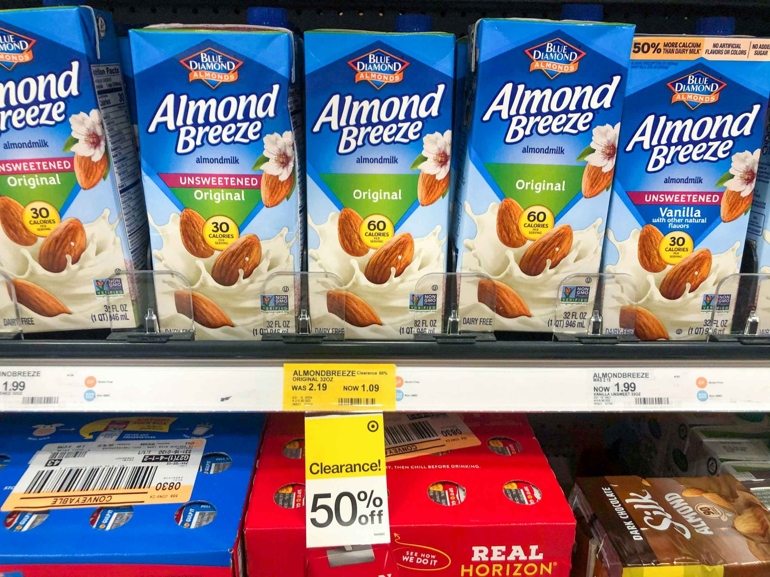 cartons of almond milk in Target aisle