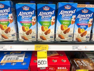 cartons of almond milk in Target aisle