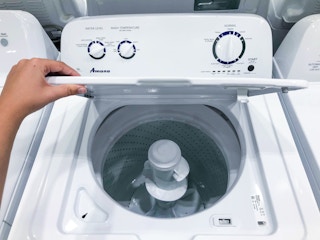 hand opening washing empty washing machine