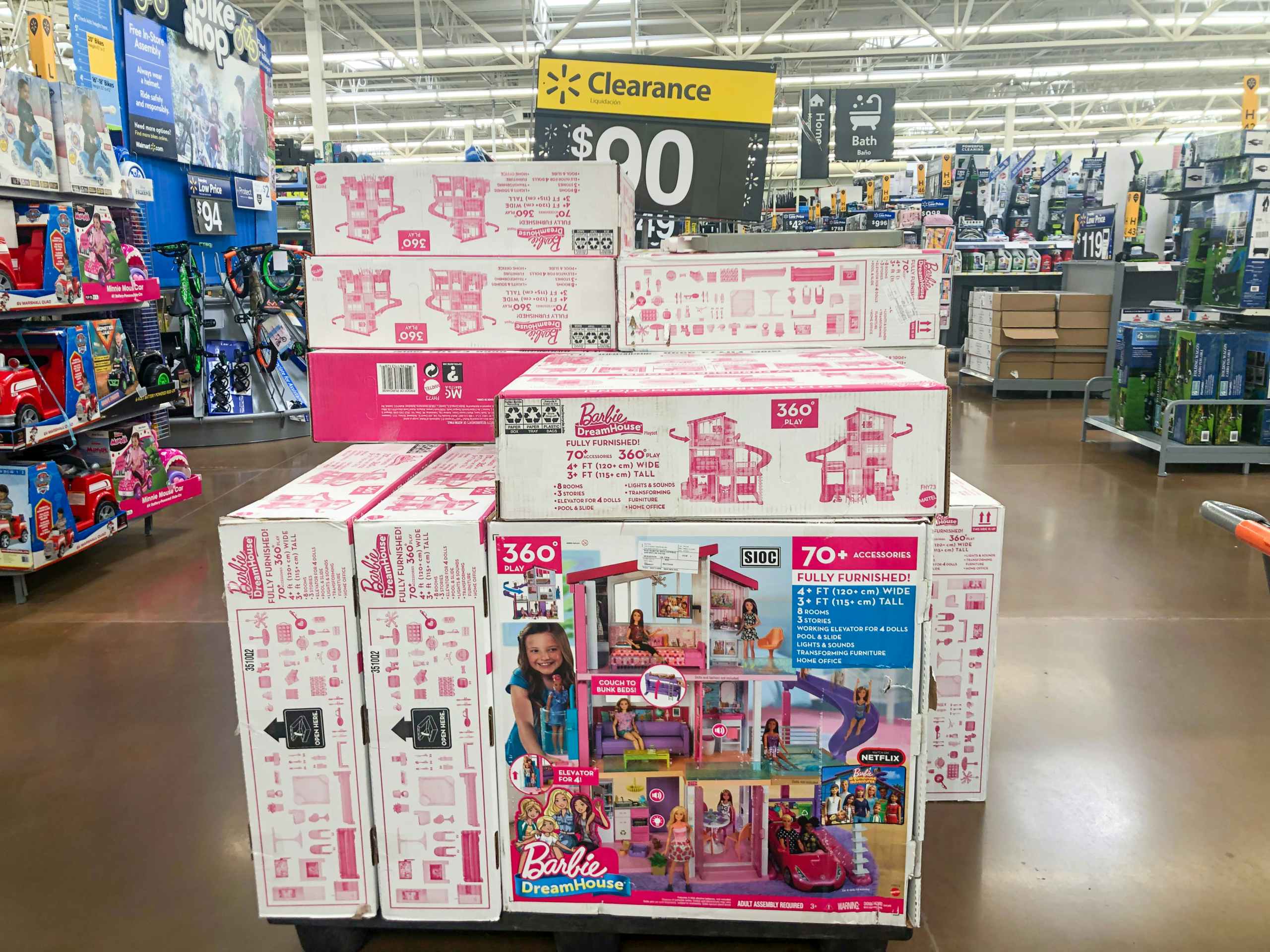 stacked display of Barbie Dreamhouses at Walmart