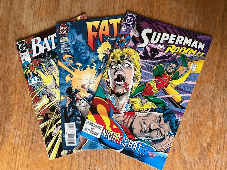 Batman comics laid out on a table