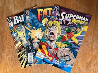 Batman comics laid out on a table