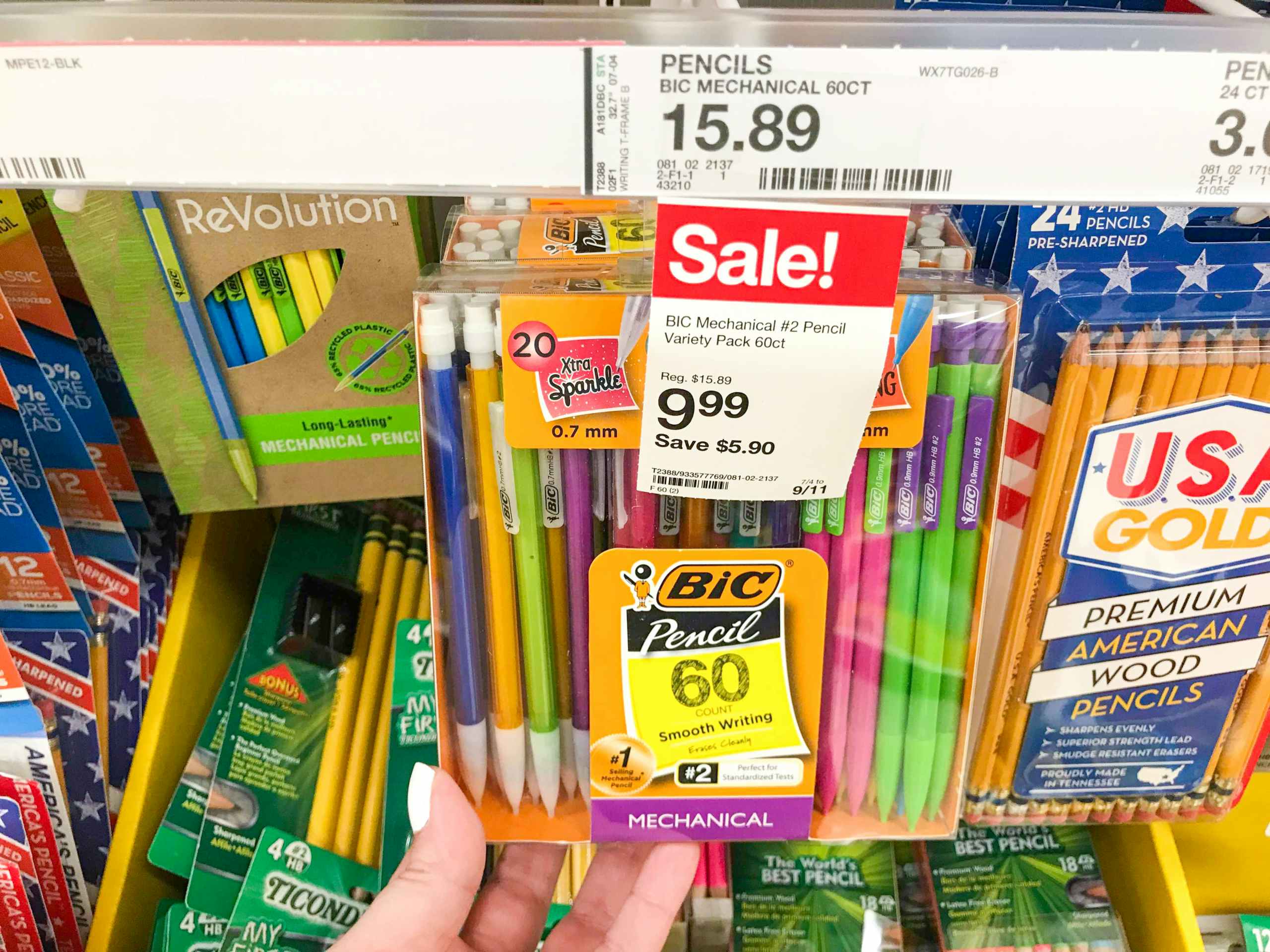 hand holding 60-pack of BIC mechanical pencils on store shelf