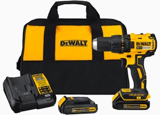 stock photo of dewalt drill with two batteries a charger and carrying bag on white background