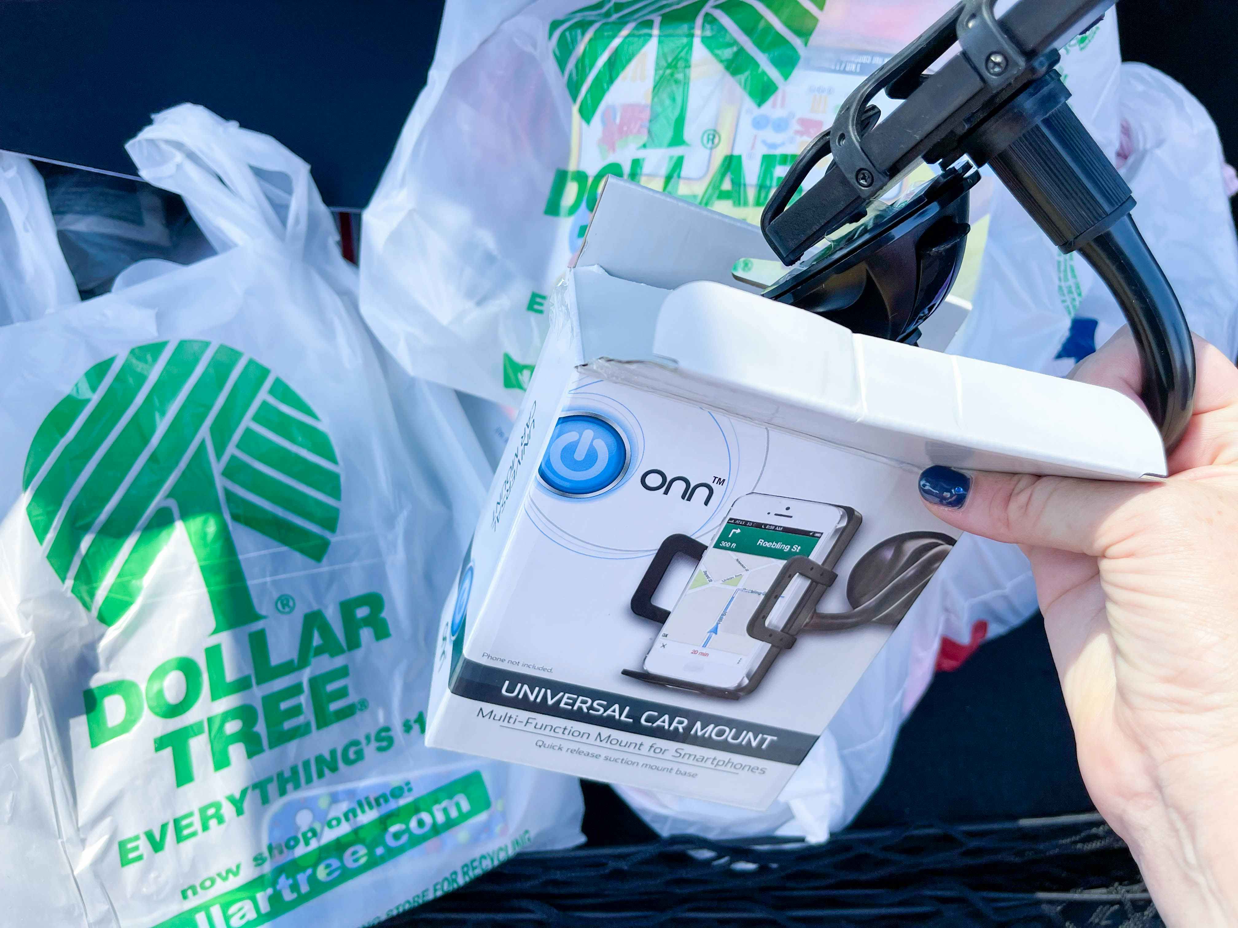 cellphone car mount out if box in front of dollar tree bags