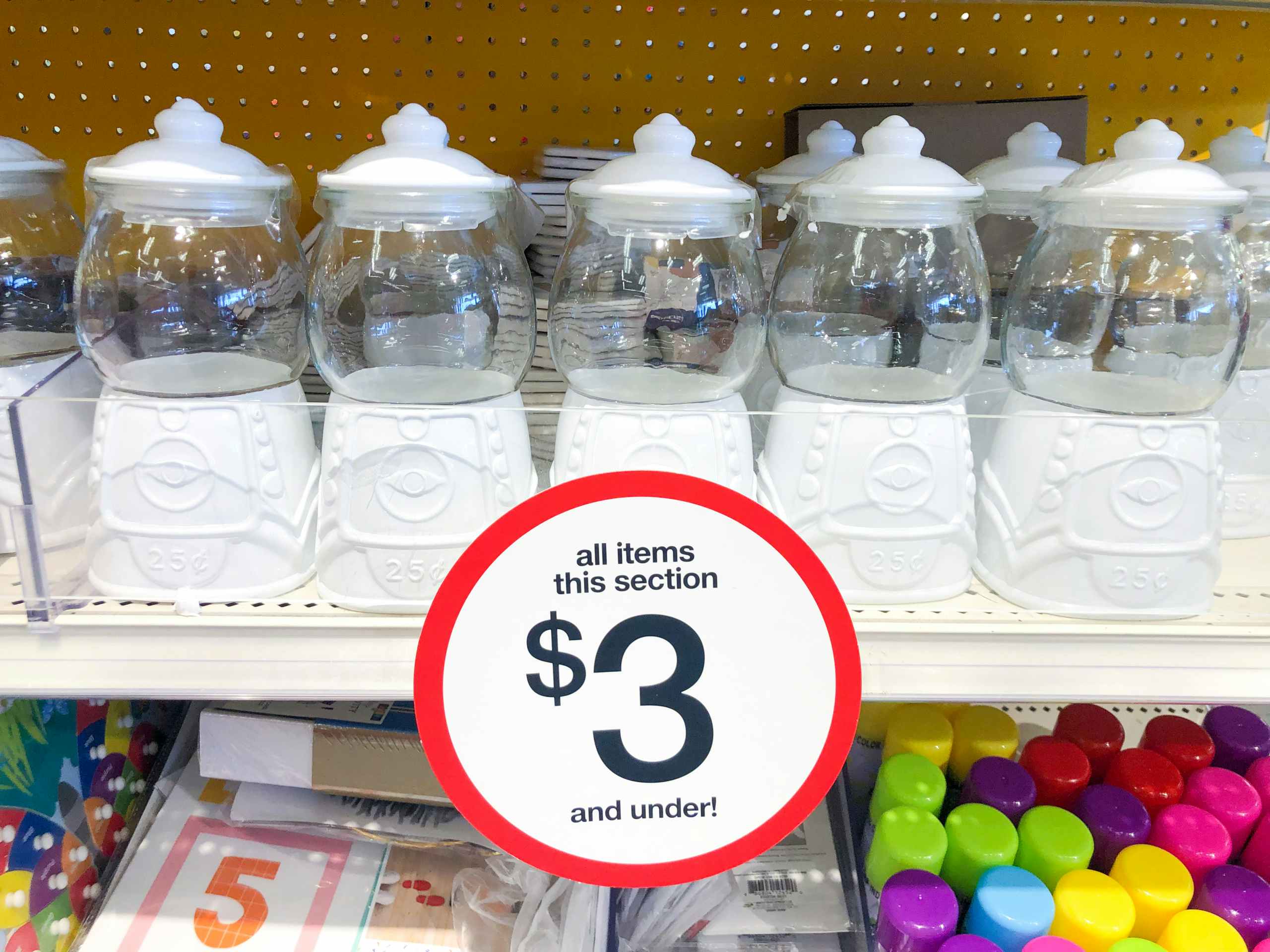 shelf of gum ball machines at Target