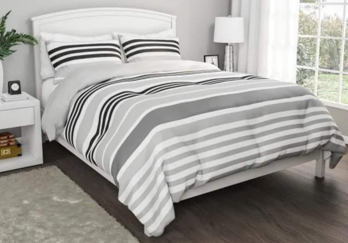 stock photo of lavish home down alternative comforter staged in bedroom