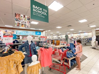 child shopping for jeans