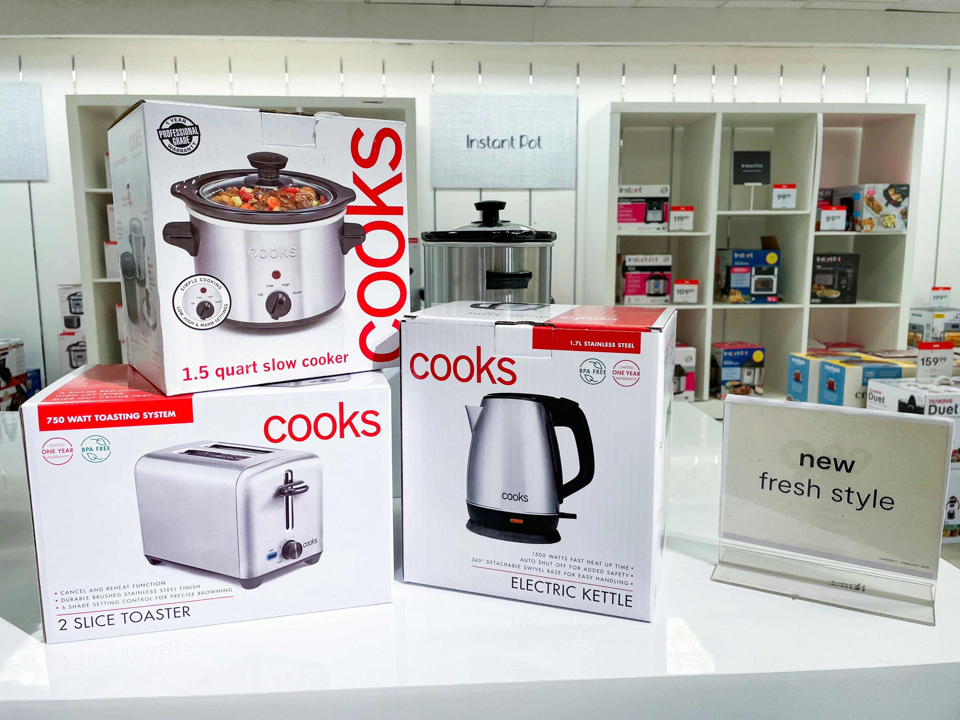 Cooks Small Appliances stacked on a display inside JCPenney.