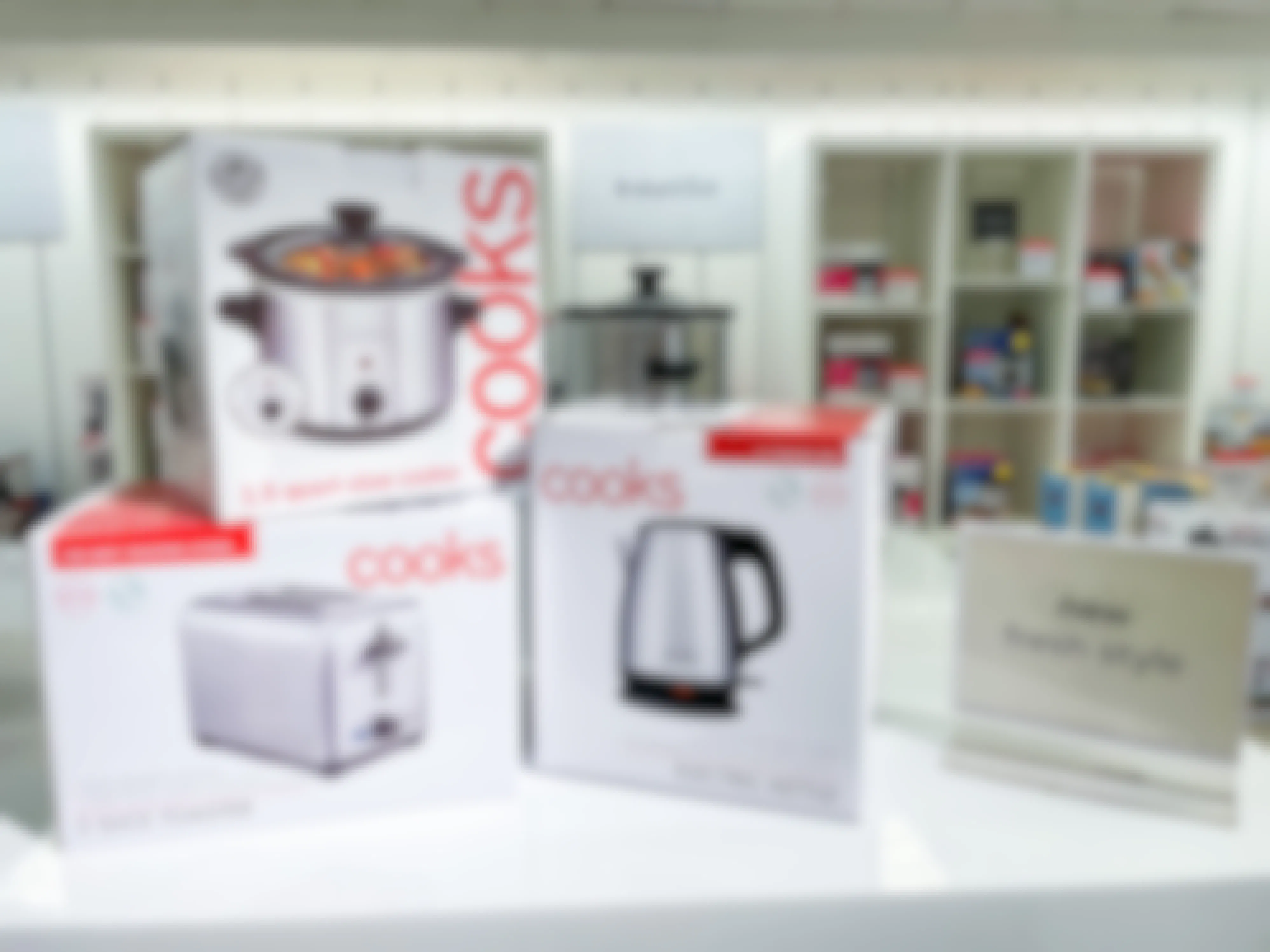 Cooks Small Appliances stacked on a display inside JCPenney.