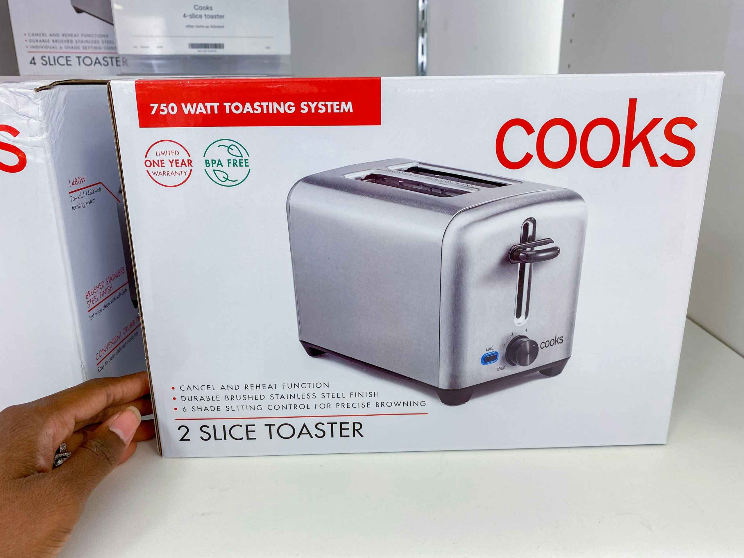 cooks toaster on shelf