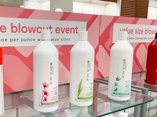 Three jumbo liter Matrix Biolage shampoos on shelf