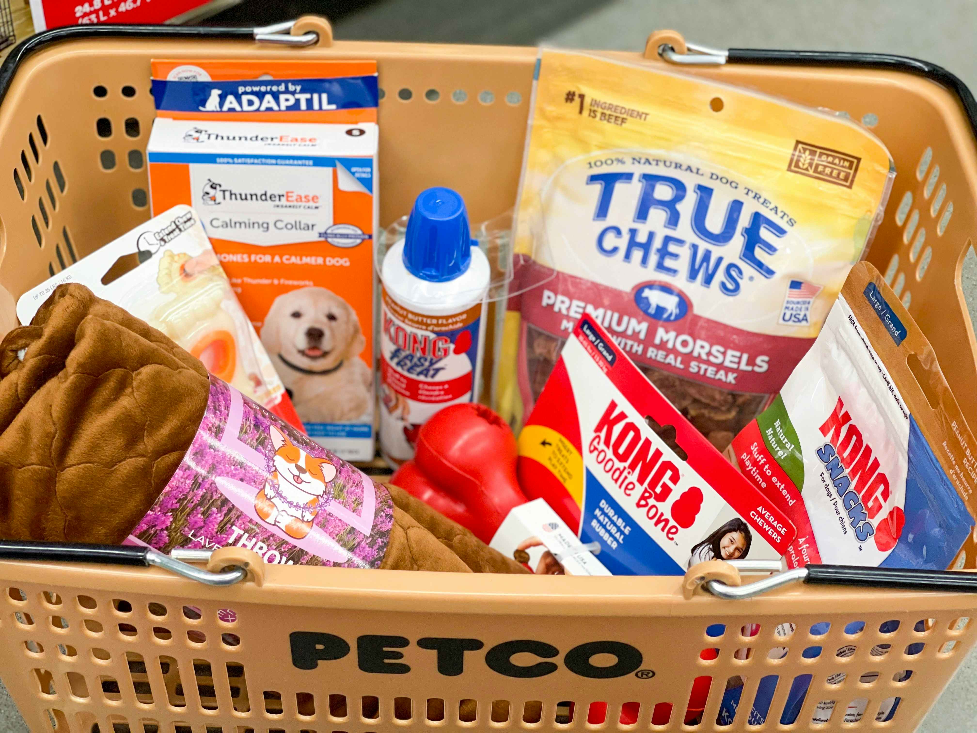 Petco basket with dog toys, dog chews, and other pet supplies