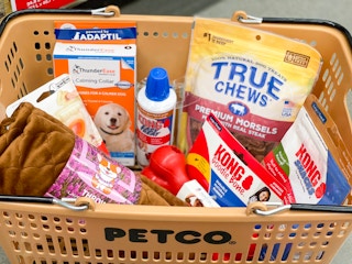 Full basket of pet items at Petco