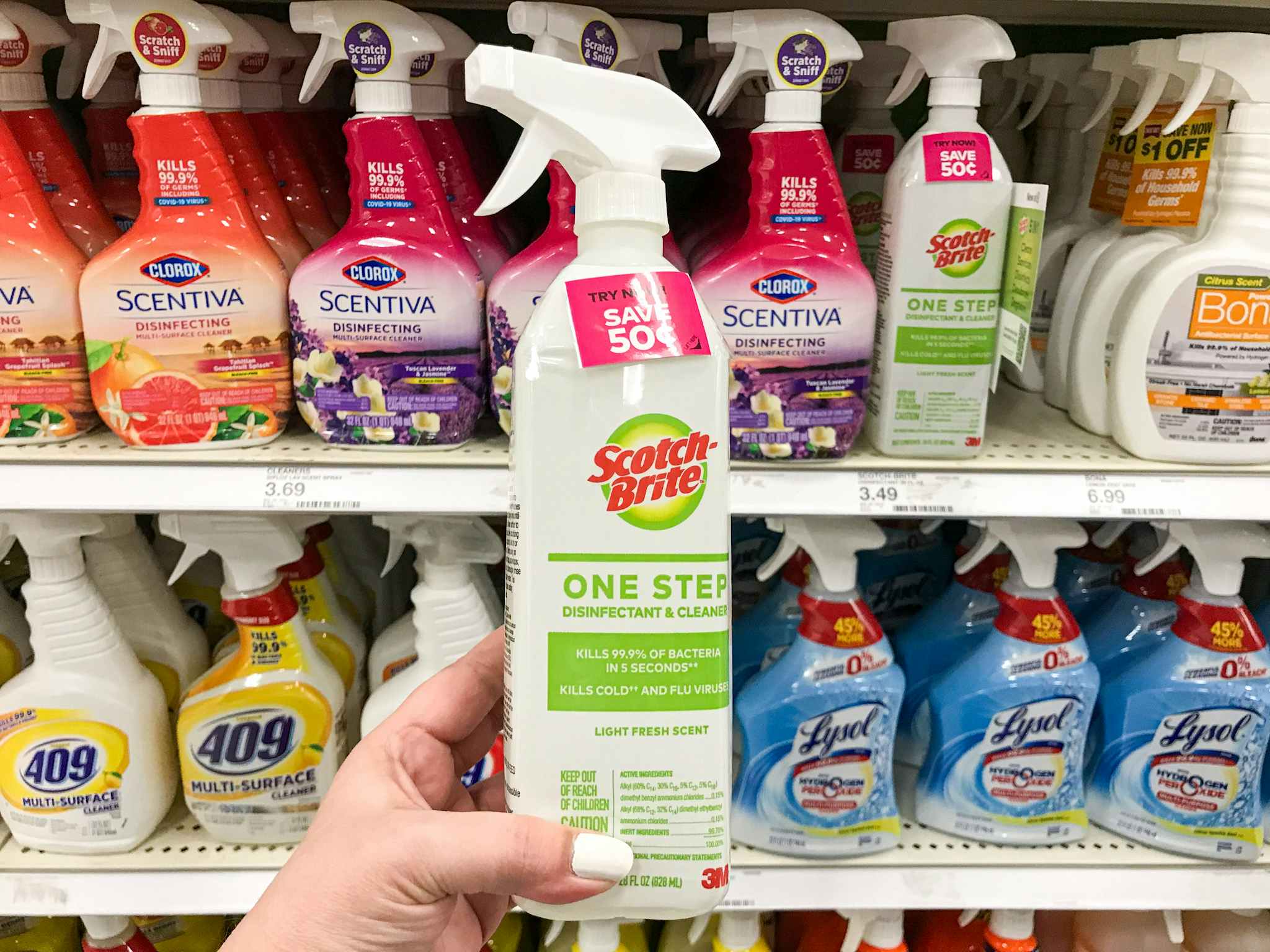 hand holding a bottle of Scotch-Brite disinfectant and cleaner at target
