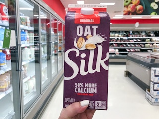 hand holding silk oatmilk at target