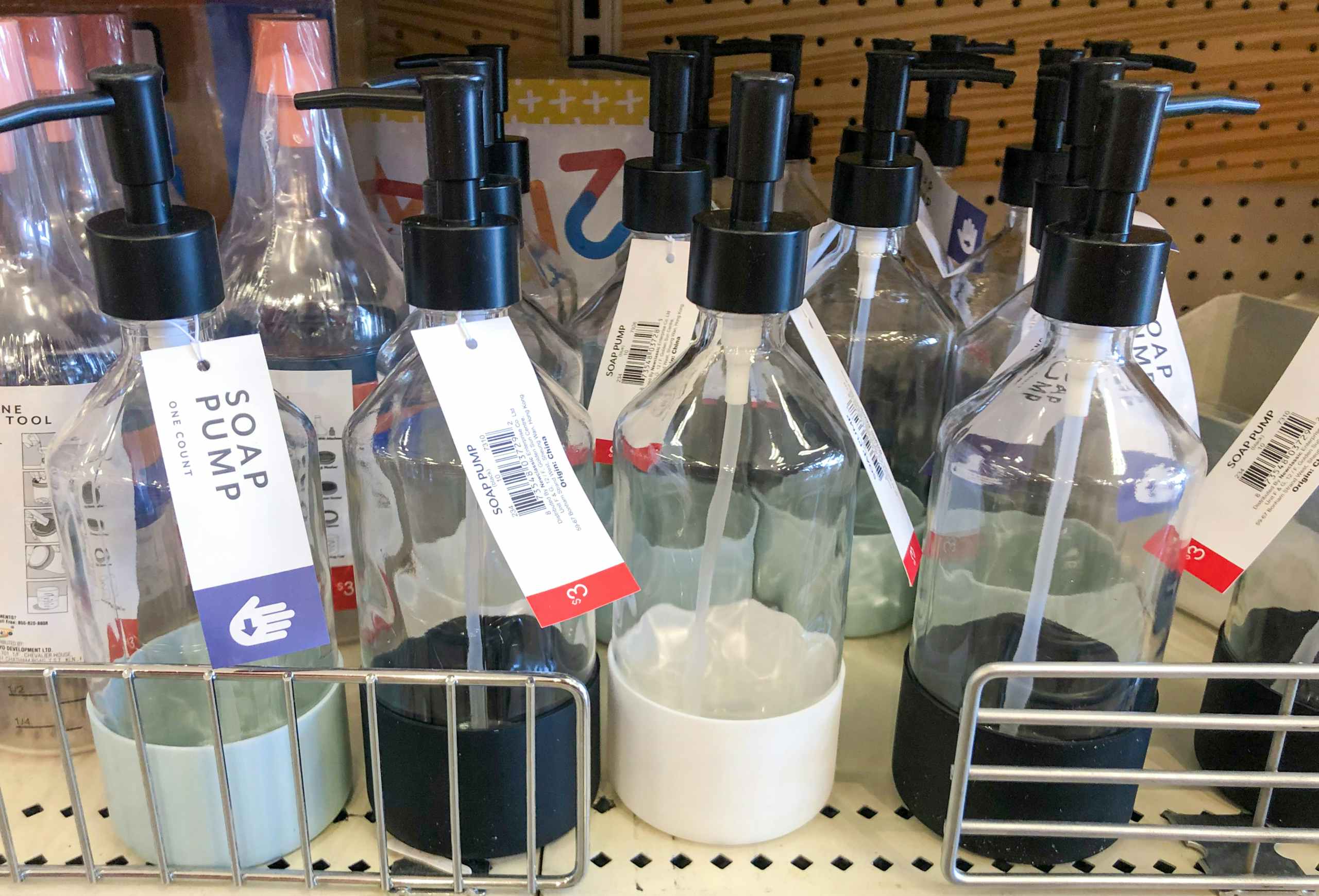 glass soap bottles on store shelf at Target